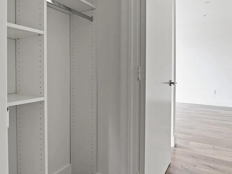 Walk-In Closet with Built-In Organizers