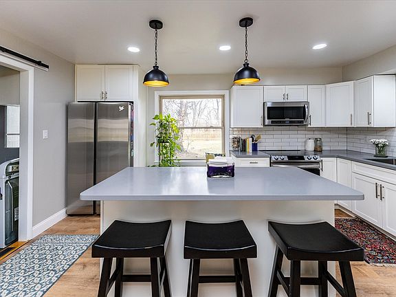 4th image of 7013 Tousley Dr