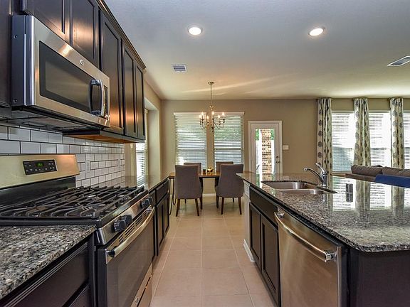 Beautiful kitchen with huge island! Gas stove, stainless appliances.