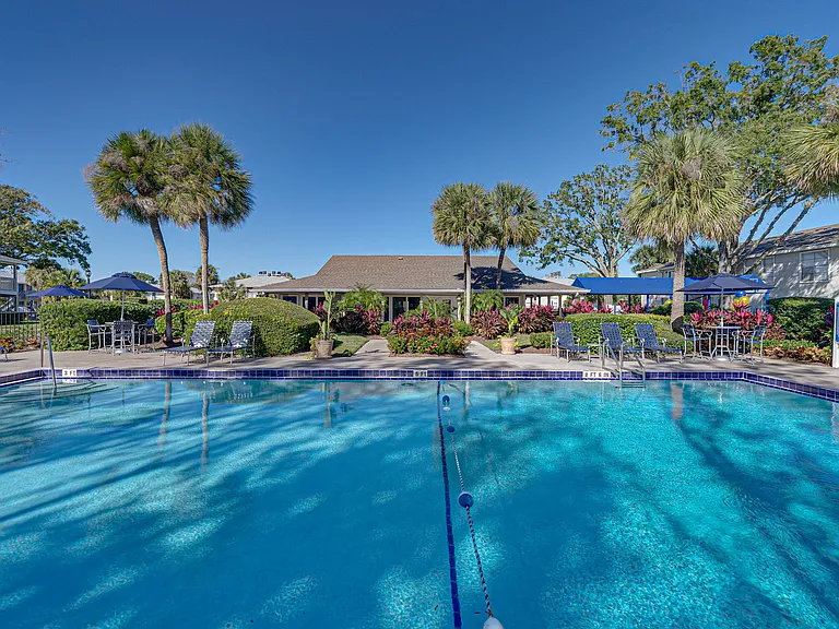 Relax poolside with comfortable lounge seating and beautifully landscaped surroundings.