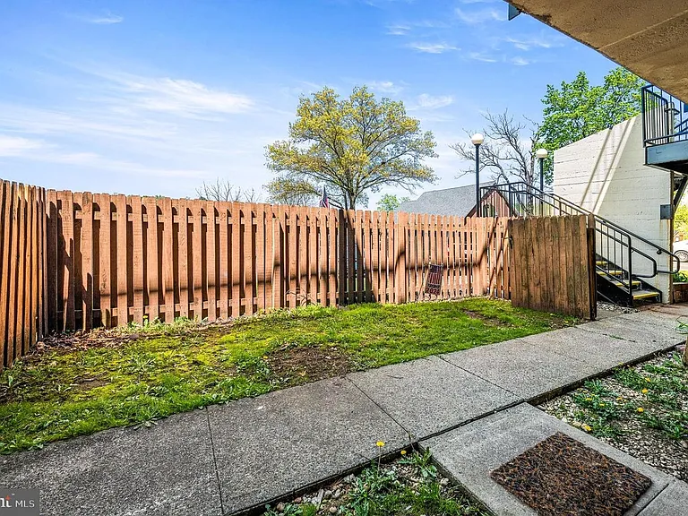 Private outdoor patio with fence - perfect for breakfast, or reading a book, or small kids play area