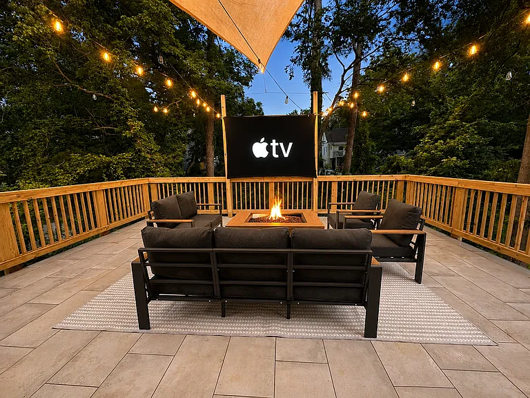 Watch movies under the stars, gather around the fire, play games and create unforgettable memories with your own private rooftop deck and skyline views. Featuring a 150" outdoor theater, fire pit, lounge seating, and games.