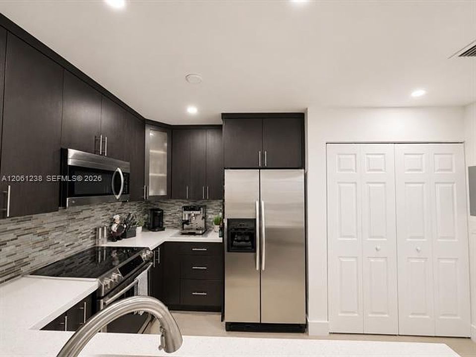 1st image of 12610 SW 54th St #Townhouse 12610