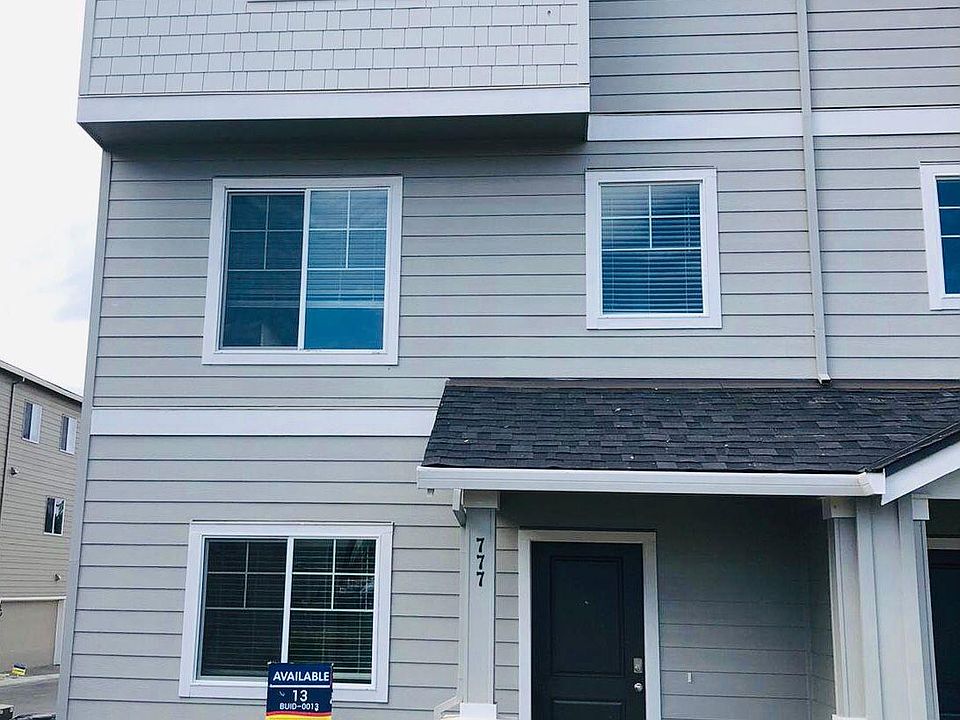 The house from the outside with the front door