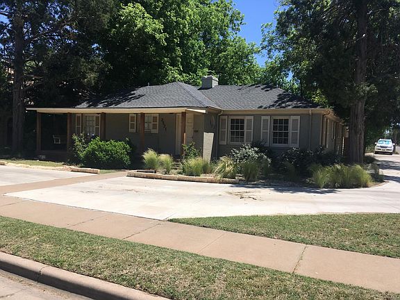 Lots of trees, big front porch with a porch swing to enjoy on beautiful days!