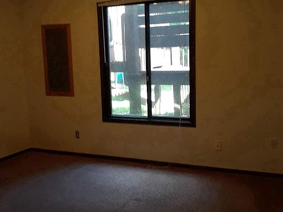 Bedroom on the middle lower level by the lower bathroom, win