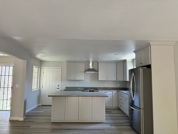 New kitchen with new cabinets, quartz countertops and new stainless steel appliances