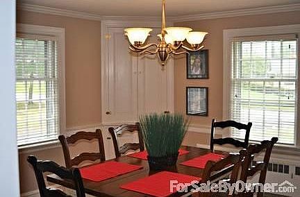 Dining Room
						:
						Two custom hutches, crown moulding and chair rails.