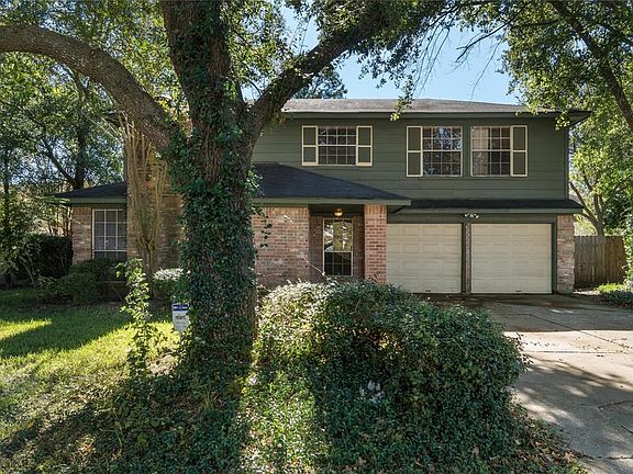 Located on a beautiful tree lined Cul De Sac