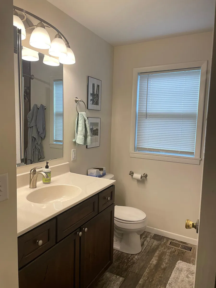 Well-lit bathroom vanity - 907 Westside Dr