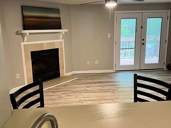 Wood-burning fireplace. Entire house is equipped with wireless smoke and CO alarms....one alarm activates all alarms at same time.