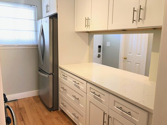 Quartz countertop doubles as drop zone and meal prep space