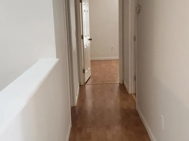 corridor to 2 bedrooms and bathroom