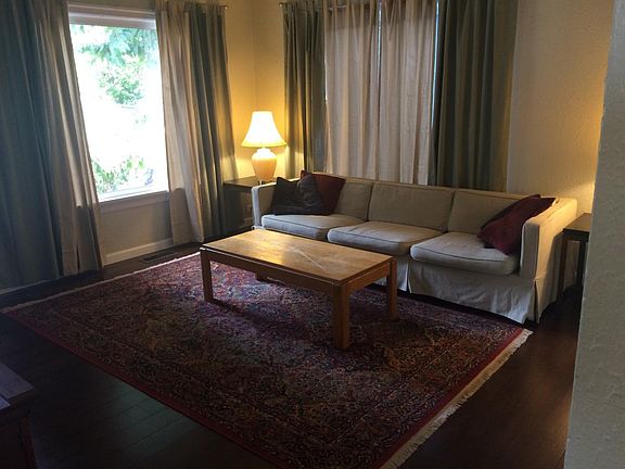 Living room w/solid Bamboo Floors and Large windows
