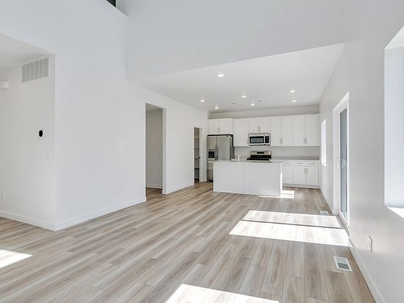 Living room with vaulted ceiling