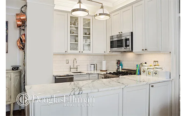 Sold by Douglas Elliman | media 13