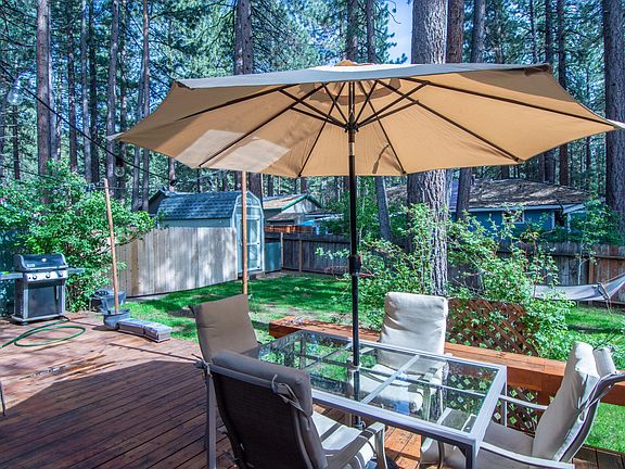 Backyard patio with storage shed