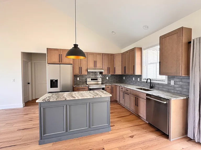 Custom Kitchen with stainless appliances