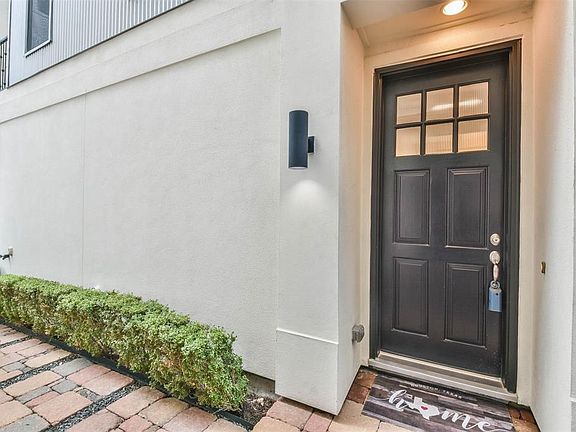 Lovely entrance to the home on the side of the townhome.