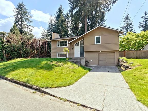 Front of the house with long driveway