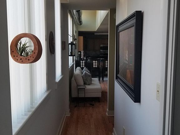 The hallway connecting the main level master and the living space.