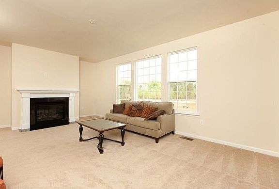 The Quentin Family Room with fireplace