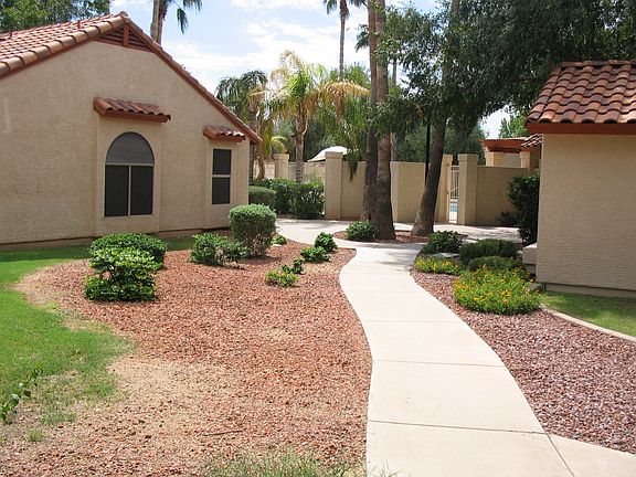 View of community pool from front of home