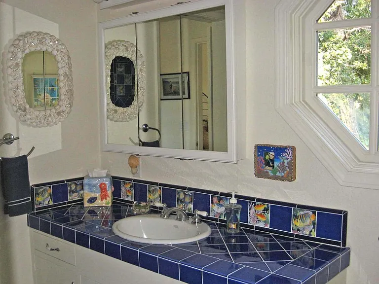 Upper bathroom with nautical tile