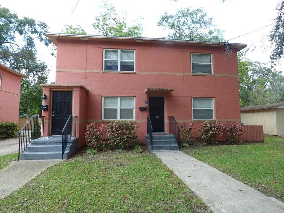 Front entrance is the door on the left. Private parking with