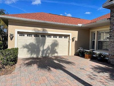 Side view with 2 car+ garage