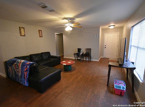 3rd image of 9242 Village Brown