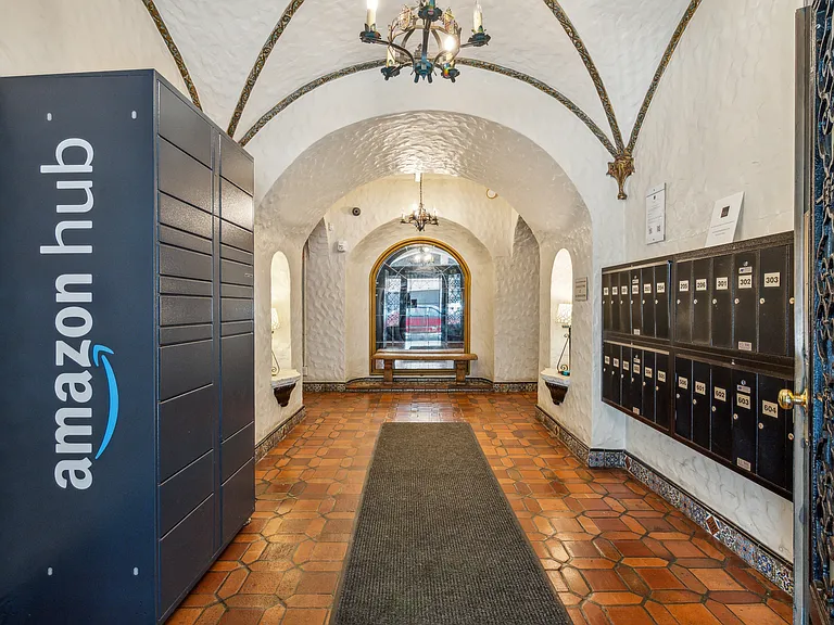 Lobby with a front desk and an Amazon Hub Locker