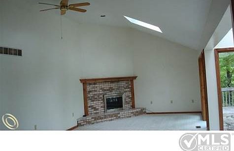 Family Room with Wood Burnin.JPG