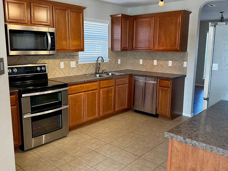 5704 Drystone Ln — Photo 3