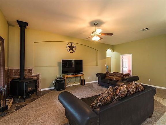 It is hard to picture a roaring fire on a brisk winter night in Texas right now, but fireplace is sitting there just waiting for those to come back around, like most of us are. To beat the Texas heat, this home was designed with wonderful cool colors to k