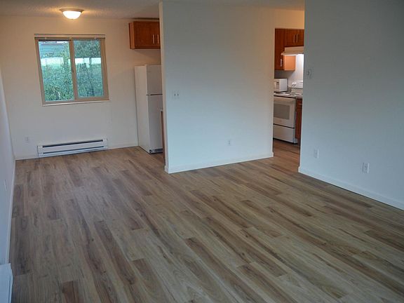 New hardwood floors in the living room, dining room, kitchen and hallway.