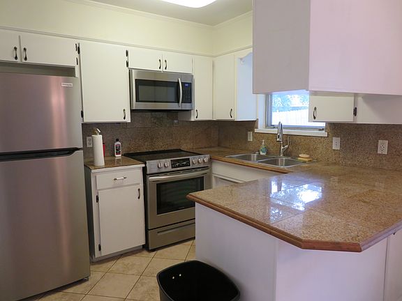 Kitchen with white cabinets