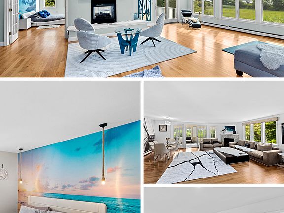 Open windows with the harbor view, living and a kitchen photos below