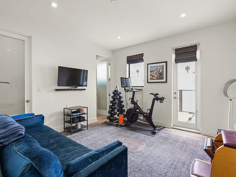 Stay tuned for updated photo of third bedroom; currently mini gym w/ en-suite full bath, walk-in closet and access to patio