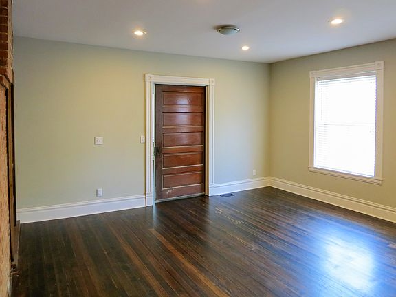 Front room is can be made private using the original pocket door