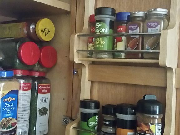 Spice rack in cabinet