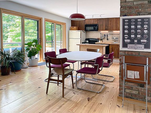 Open bright kitchen/dining
