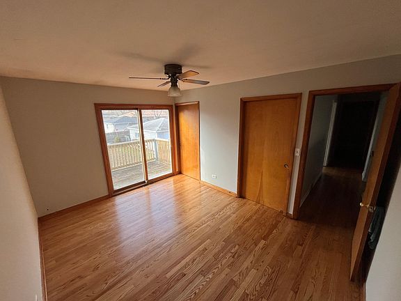 Upstairs bedroom with patio