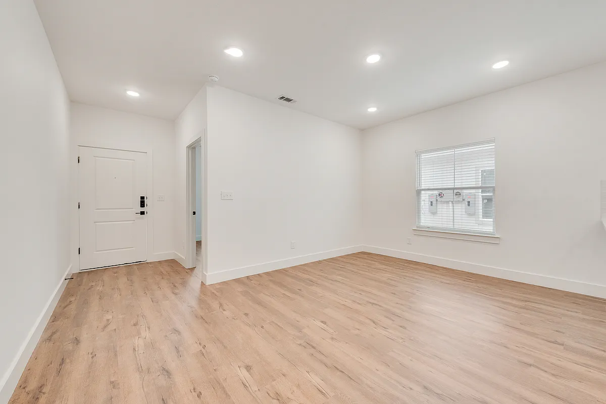 Looking at front door from living room - 913 E 10th St #2