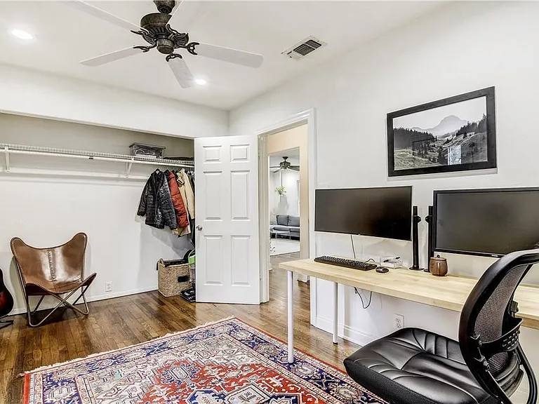 Second Bedroom, great as a bedroom or an office with a door that opens to the private fenced in backyard with large back patio