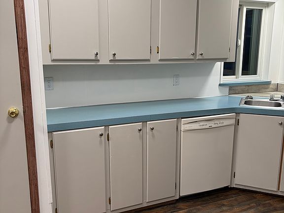 Kitchen counter and pantry.