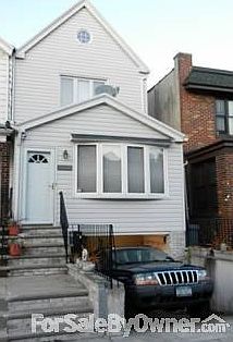 Front of House
						:
						Bow windows on 1st floor, casement windows on 2nd floor with carport
