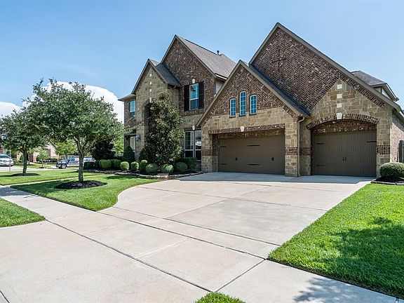This home has gorgeous stone & a patterned brick elevation that is sure to WOW! A widened driveway leads up to a 3-car garage that offers plenty of parking!