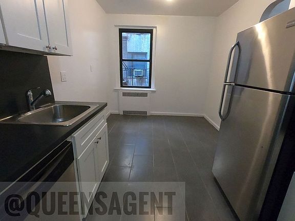 4th image of 8449 Elmhurst Ave #2K