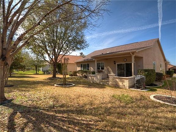 Enjoy your time on the back patio overlooking your beautiful backyard!